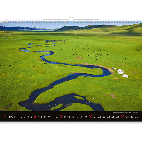 A green plain that is divided by the rushing current of a swift stream. Nature blooms in all its beauty in this landscape. Experience the beauty of spring with Mountain view Calendar 2025.