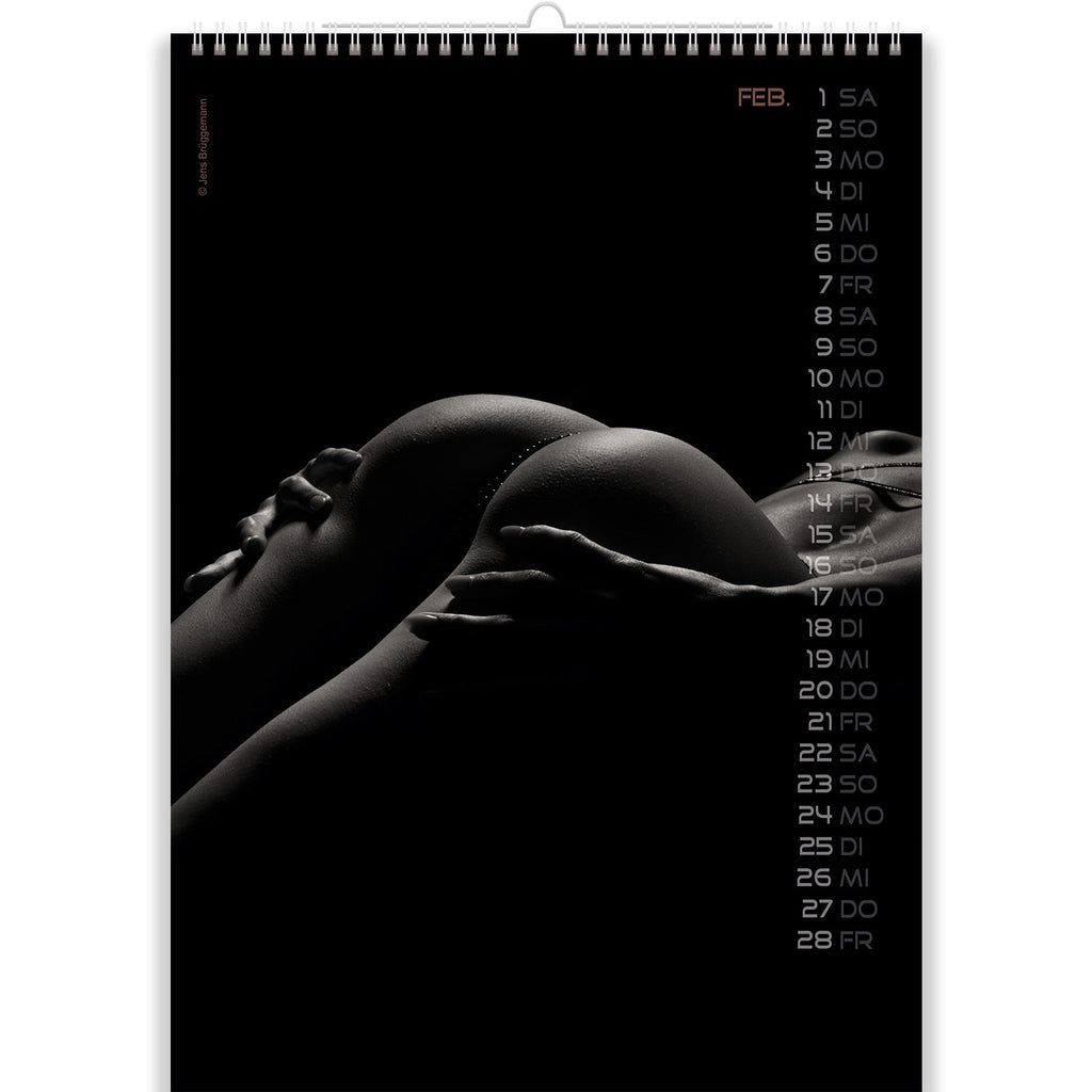 Hot Girls Grabs Her Big Round Ass in Sexy Woman Calendar