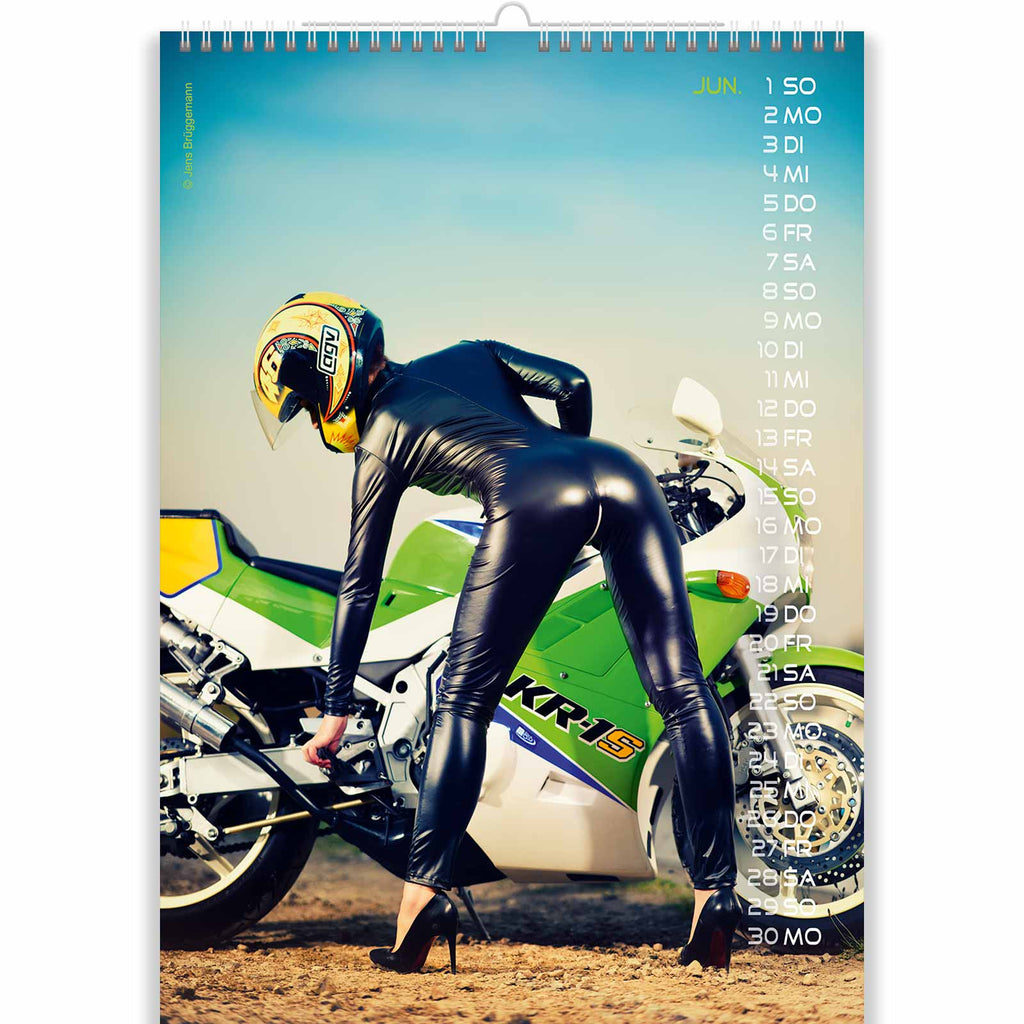 Woman in Latex Rides a Bike in Fetish Calendar