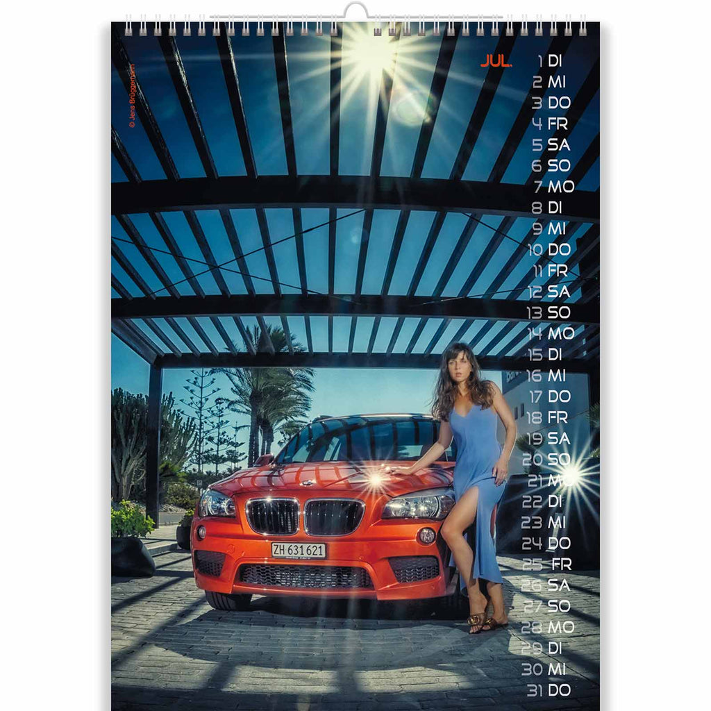 Brunette in Blue Dress in Sexy Car Calendar