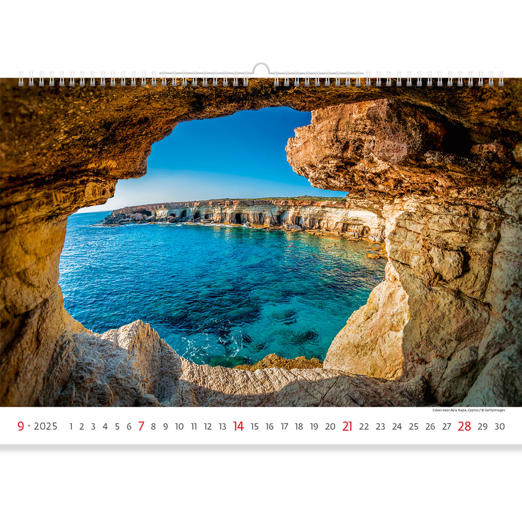 An image amazing in its calm. The rocks seem to form a window through which calm sea waters are visible. Feel the comfort with Sea Calendar 2025. 