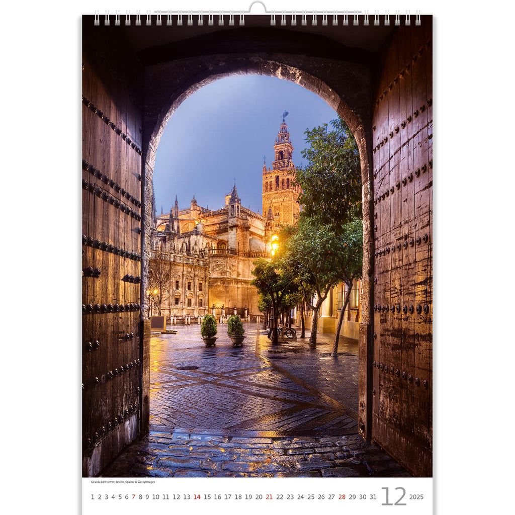 December in the Romantic Calendar 2025 features an archway framing the historic splendor of a rain-soaked courtyard. This enchanting scene captures the beauty of winter rain, enhancing the charm of the courtyard with glistening cobblestones and reflecting the timeless allure of romance amid historical elegance.
