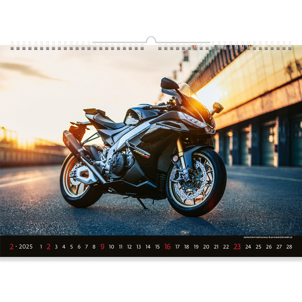  The Motorbike Calendar 2025 features a golden sunrise kissing the sleek curves of a poised motorbike. This captivating scene captures the essence of freedom and adventure, highlighting the beauty of a motorcycle against the backdrop of nature's breathtaking moments, inviting riders to embrace the thrill of the open road at dawn.