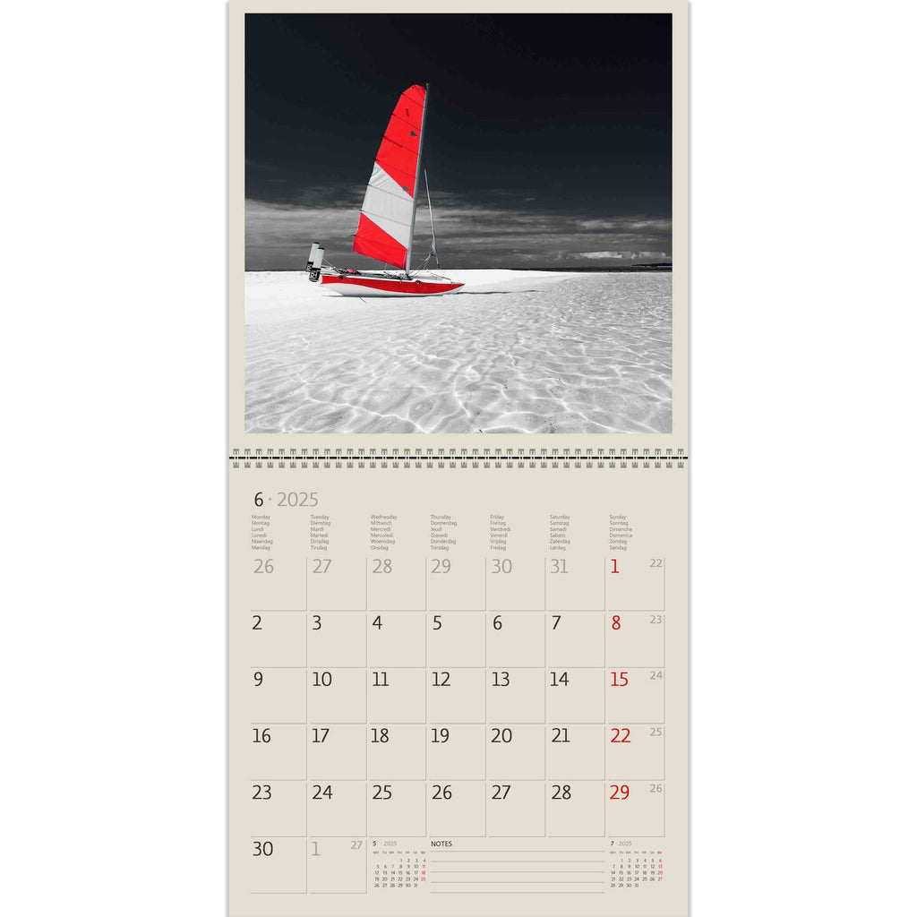 Red sails floats peacefully in the sea breeze. Appreciate this beauty with our Black Red Calendar 2025!